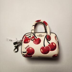 NWT Coach CZ082 Mini Rowan Bag Charm Chalk w/Red Cherry Print Leather